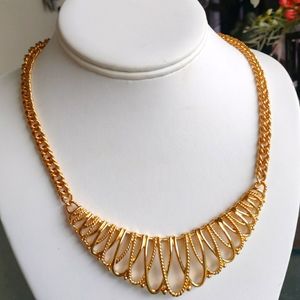 Bright gold openwork necklace #260